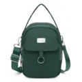 Fashionable dark green nylon crossbody bag with multi zippers, top handle and adjustable strap. - Green