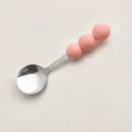 Cuillère en acier inoxydable avec poignée à billes roses macaron pour gâteaux et desserts. - Cuillère Rose