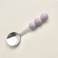 Cuillère en acier inoxydable Macaron avec trois perles violettes, idéale pour les desserts. - Cuillère Violette