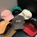 Detailed view of colorful soft-top baseball caps with embroidery letters, multi-color variety. - Adjustable / Khaki