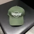 Detailed view of the army green structured baseball cap with stylish white embroidery text. - Green