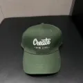 Detailed view of dark green baseball cap with embroidery, casual sun protection style. - Adjustable / Green