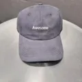 Grey embroidered baseball cap detail showing premium stitching and the Awesome text design. - Gray