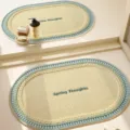 Oval woven bathroom floor mat with soft texture, absorbent non-slip rug for home decor. - Kiwi Juice