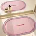 Cream style woven oval bath mat with embroidery design for bathroom non slip floor. - Milkshake Shaved Ice