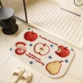 Detailed view of the cute cartoon fruit embroidered bathroom absorbent non-slip floor mat. - 60*90cm / Velvet Embroidery Fruit Fun