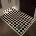 Modern black and white checkered door mat entry rug with green border and chic design. - 90x120cm (8mm Coiled) / Powerscourt