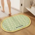 Oval woven bath mat with green and white pattern, quick-drying anti-slip bathroom floor mat. - Cream Green Weave Language