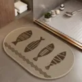Oval anti-slip absorbent bath mat with cute fish pattern for bathroom and kitchen home decor. - Cute Fortune 12