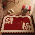 Festive red tufted floor mat with auspicious Chinese characters for home entryway decor. - Vintage Step Blessing