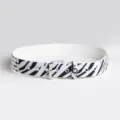 Close-up detail of a fashion zebra print women's belt with silver buckle and square studs. - Three-Row Rivet Style / 100cm Size / White
