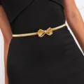 Elegant women rhinestone bow metal waist chain, adjustable elastic gold belt detail shot. - Gold Rhinestone Bowknot Spring Chain