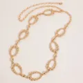 Detailed view of the retro gold carved metal oval link chain belt design and fine texture. - Style A4 / Gold