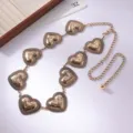 Catena da vita vintage dorata in metallo con cuori per donne, elegante cintura a catena. - Cuore di pizzo / Oro