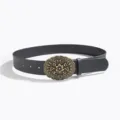 Close-up detail of vintage western retro carved metal buckle black women leather belt - Oval Carved Buckle Style A