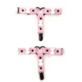 Detail shot of cute pink leather garter leg ring with white bear charms and adjustable straps. - One Size / Pink