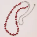 Detailed view of women's silver waist chain featuring vibrant red crystal rhinestone elements. - Red Rhinestone Belt F