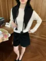 Chal triangular de punto estilo coreano para mujer, capa elegante con borlas trenzadas. - Talla única / Negro