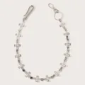 Metal cross pants chain detail showing gothic hip-hop waist chain links and hook hardware. - Silver