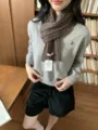 Brown wool cable-knit scarf detail worn by model, cozy winter neck warmer accessory. - One Size / Grey Coffee