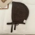 Hollow out knitted balaclava cap for women, cozy brown tie up bonnet hood with cute ear flaps. - Brown