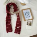 Close-up detail of the Korean style color-blocking knitted scarf with cozy texture. - 180x7cm / Red