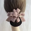 Detailed close-up of professional hair net bun cover with elegant pink bow and cute charm. - Coarse Net / Korean Pink