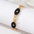 Bracelet en chaîne dorée à charms ovales en émail noir vintage avec cristaux étincelants - Noir