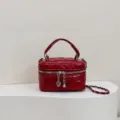 Red quilted mini chain bag stylish crossbody handbag with cute heart charm for winter fashion. - Red