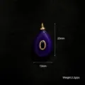 Pendentif goutte violette avec bordure dorée breloque mauvais œil pour fabrication bijoux. - Mauvais Œil en Pierre Noire (A0259) / 23x13mm / Jade Violet