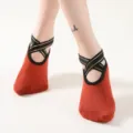 Comfortable non-slip yoga socks for women featuring stylish gold-threaded criss-cross straps. - One Size / Orange Red