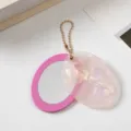 Oval mirror keychain charm pendant for cute bag decoration and car keys aesthetic accessory detail - Transparent Pink Shell Texture