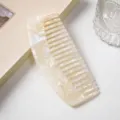 Acetate hair comb with marble texture, curved wide-tooth design for daily hair styling. - Iridescent Mermaid White
