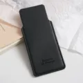 Close up of portable black PU leather comb protective pouch detail showcasing fine stitching. - Black