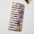 Acetate wide-tooth hair comb detail view, marble pattern anti-static design for styling. - Floral Purple