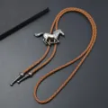 Vintage Western cowboy bolo tie with alloy running horse pendant and braided brown leather cord. - Antique Silver + Light Brown PU