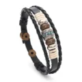 Bracelet en cuir tressé multicouche avec perles de cristal et anneaux métalliques, style punk. - Noir