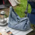 Casual denim shoulder bag for women, stylish slouchy hobo crossbody bag for daily use. - Blue