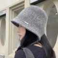 Grey knitted bucket hat detail, cozy winter basin hat with side straps and fine metal tag. - M (56-58cm) / Gray