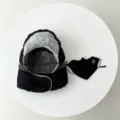 Detailed shot of winter warm ushanka hat with plush faux fur trim and matching black mask. - One Size / Black