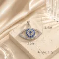 Close-up detail of exquisite evil eye pendant sparkling with blue and white cubic zirconia. - Blue and White Rhinestone Brick Style (04)