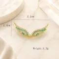 Connecteur pendentif aile plaqué or avec strass verts et blancs accessoires de bijoux DIY. - Strass Vert Doré