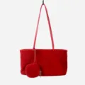Red suede shoulder bag detail view, elegant hobo design with a mini pouch for women daily. - Red