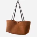 Brown suede tote bag detail, large capacity commuter shoulder bag craft showcase - Caramel color