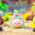Cute resin pig mini figurine with pink bow in green bag for car dashboard and desktop decor. - 059 Lucky Bag Pig