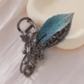 Pince à cheveux exquise brodée de feuilles en strass avec papillon et perle élégants. - Pince Crabe Papillon Feuille Vert Gris