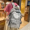 Grand sac à dos d'étudiant de grande capacité avec imprimé paysager élégant et fermetures éclair. - Sac à dos avec pendentif / Noir