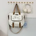 Sac à dos en toile blanche avec bretelles marron, cartable élégant pour les étudiants. - Sac à main / Kaki