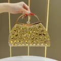 Borsa da sera di lusso in strass con manico in metallo, elegante pochette dorata per donne. - Oro