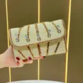Elegante borsa pochette di perle e strass, elegante borsa da sera da donna e tracolla. - Oro